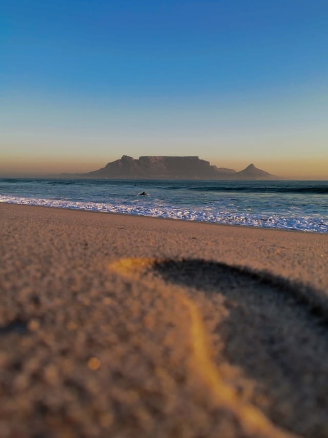 Table Mountain seen across a peaceful beach